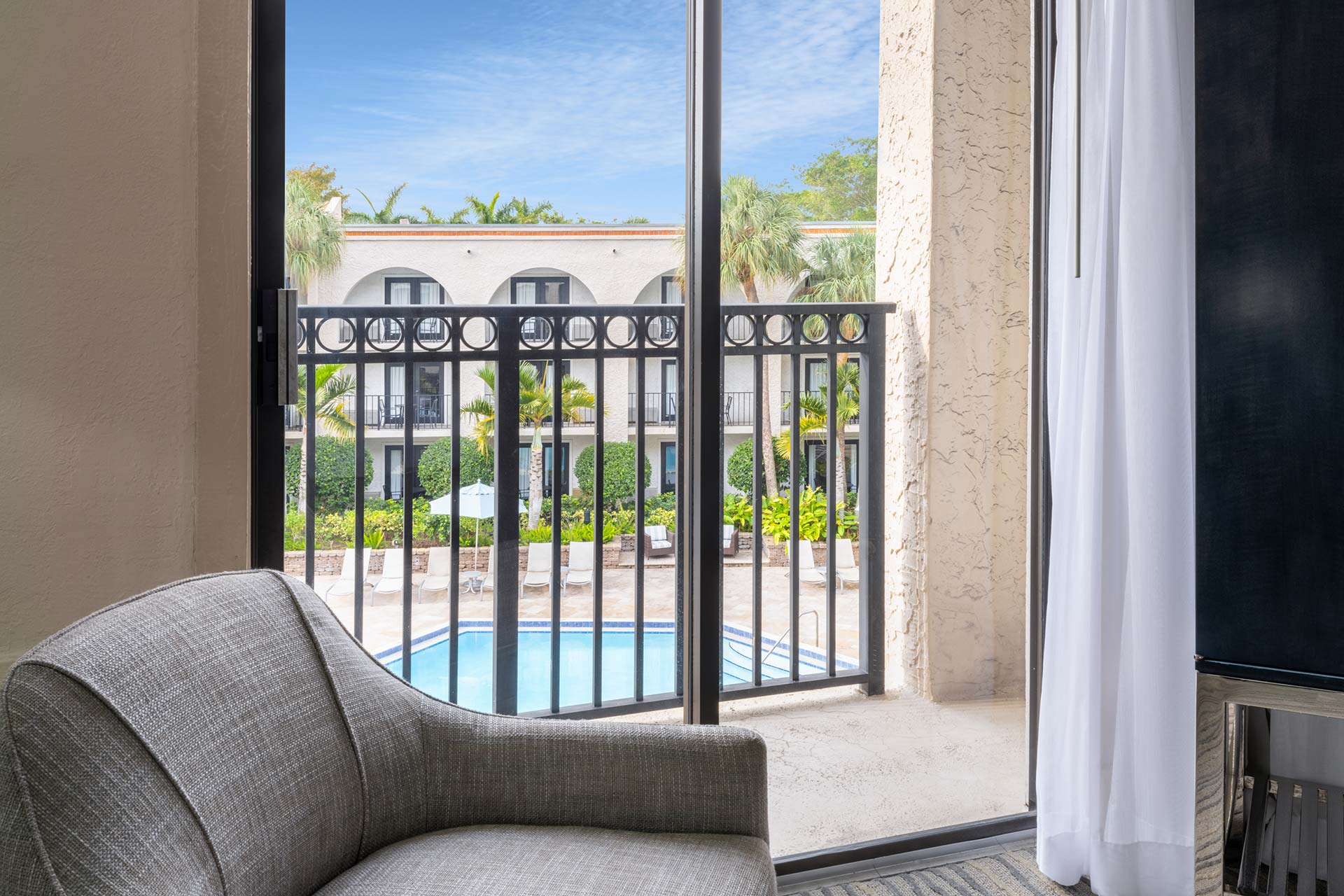 Private balcony with a pool view