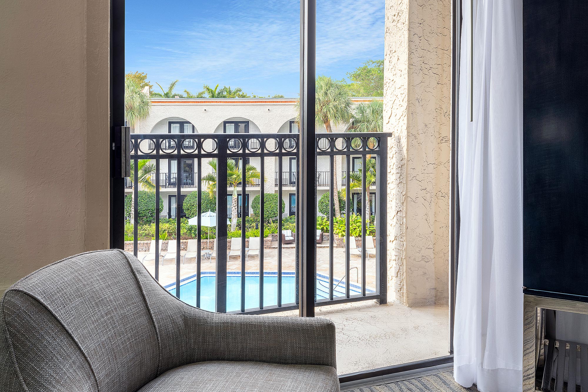 Private balcony with a pool view